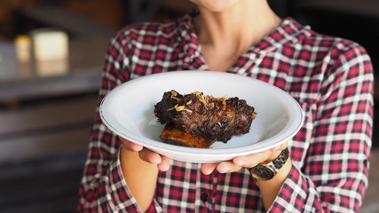 offering a delicious plate of grilled honey ribs plate