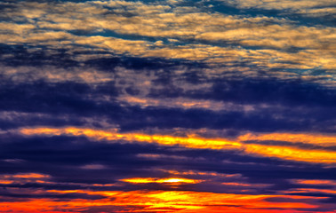 Naklejka na ściany i meble Beautiful sunset with colorful clouds in the sky