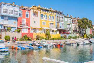 Port Sa Playa, Valencia, Spain - 3/19/2019: Bright sunny day photo looking at Port Saplaya, Valencia's Little Venice