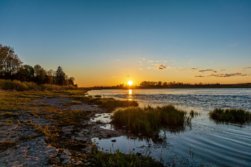 Sunset on the river. Pskov region Russia