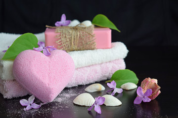 Heart-shaped bath salt and cosmetic soap with a light lilac scent.