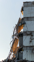 Last piece of a demolished building at sunset in Amsterdam