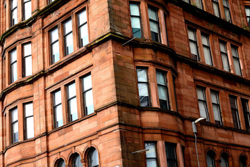 Red facade of an old building in Glasgow