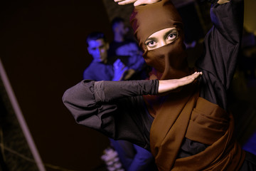 Girl in a ninja costume. Traditional samurai clothing. Artistic processing. The presence of artistic noise in the photo © Светлана Наклейщиков