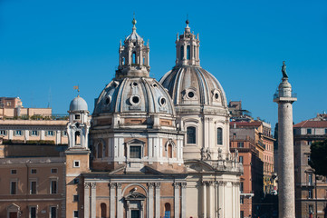 Fototapeta na wymiar the twin churches of Piazza Venezia, arranged in front of the Trajan Column and the Trajan Forum in Venezia square