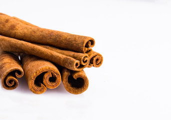 cinnamon sticks on white background