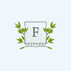 Green eco letters F logo with leaves in square shape. Initials with botanical elements with floral letter design for business identity style