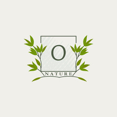 Green eco letters O logo with leaves in square shape. Initials with botanical elements with floral letter design for business identity style
