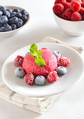 Raspberry sorbet on plate