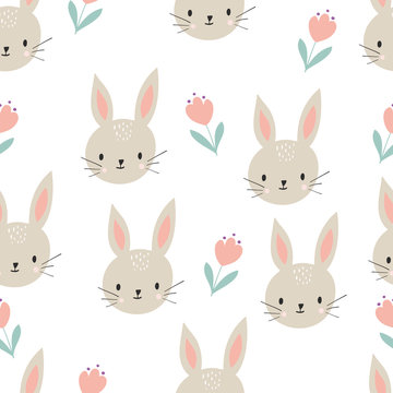 Seamless pattern with cute hares with flowers.Cute rabbit face. Seamless wallpaper.