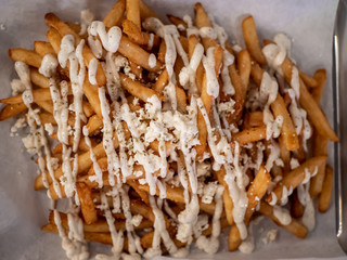 Fries close up, with sauce 