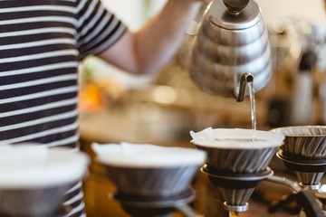coffee maker pouring coffee barista 