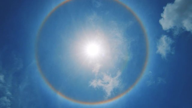 Beautiful Scenery Of Rainbow Halo Around The Bright Sky During Summer In Curacao.  - bottom shot