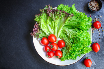 salad vegetables, lettuce and tomato Menu concept. food background top view copy space for text healthy eating keto or paleo diet organic