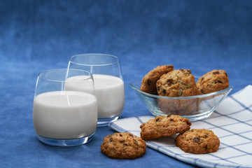 Two glasses of milk and homemade cookies