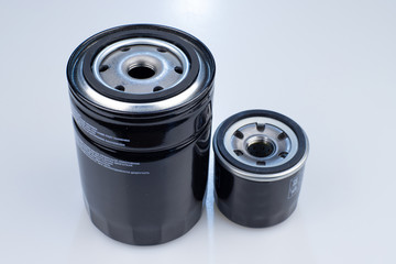 Car oil filter on a white background.
