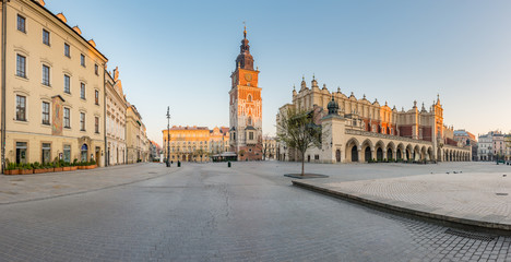 Fototapeta na wymiar Krakow, Poland, Cloth Hall and Town Hall tower on the Main Square in the morning