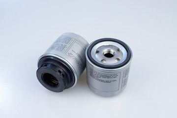 Car oil filter on a white background.