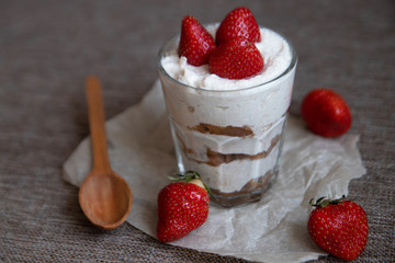 Homemade tiramisu without sugar decorated with strawberries. Healthy eating. Home cooking. We cook in self-isolation. Diet. Low in calories.