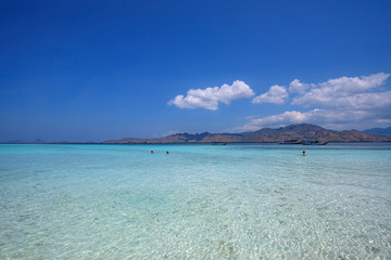 Taka Makassar Island, small sandbar within Komodo National Park. Clear turquoise water and pink sands.