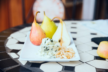 Blue cheese, pine nuts and ripe pears