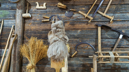 Set of old and oxide tools for agriculture and household in a farm. Antique, rusty. Countryside concept.