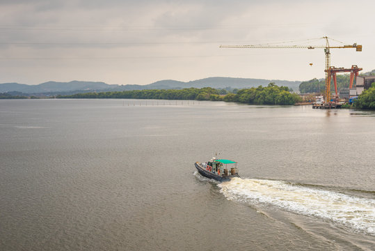 Borim,Goa/India- May 1 2020: Barges carrying mining ore for export at Borim, Goa.