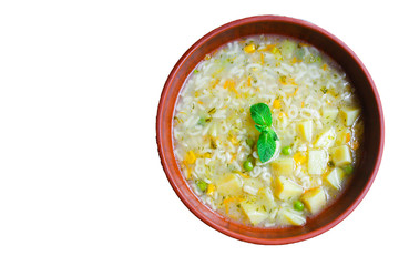 soup vegetables and pasta alphabet, peas, corn Menu concept healthy eating. food background top view copy space for text table setting keto or paleo diet organic