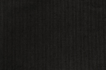 Fototapeta na wymiar Denim jeans cloth frame in trendy dark grey color. Black jeans fabric texture. Dark pinstripe jeans fabric, background