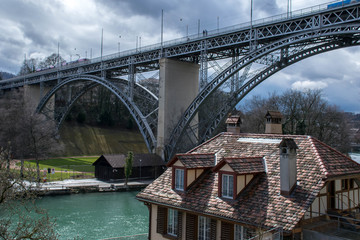 Old house and bridge through Aare river, Bern Switzerland