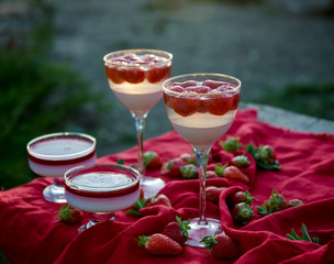 Fresh strawberry jelly on old wooden background. Tasty healthy vegetarian dessert sugar free. 
