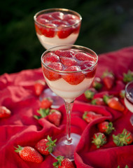 Fresh strawberry jelly on old wooden background. Tasty healthy vegetarian dessert sugar free. 
