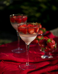 Fresh strawberry jelly on old wooden background. Tasty healthy vegetarian dessert sugar free. 
