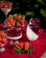 Fresh strawberry jelly on old wooden background. Tasty healthy vegetarian dessert sugar free. 
