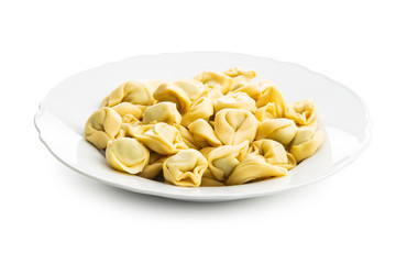 Tortellini pasta on plate. Italian stuffed pasta.