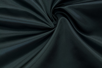 Pale dark polyester blue fabric. Synthetic fabric for background