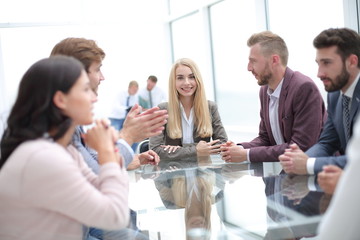 Fototapeta premium young businesswoman at a meeting with the business team
