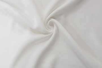 Texture of cool polyester fabric. Background of white textile