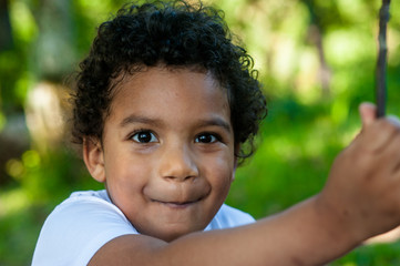 Close up of a happy african boy looking at the camera.