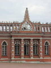 Fototapeta na wymiar Moscow / Russia – 07 16 2019: 2nd Cavalier house facade fragment close up exterior outside view in Tsaritsyno Park Museum on summer day, architecture ancient landmark