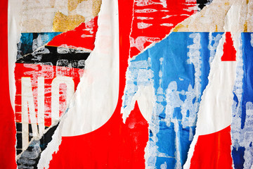 Old ripped torn posters grunge texture background creased crumpled paper backdrop placard surface / Urban street posters 