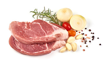 Raw pork steaks, isolated on white background