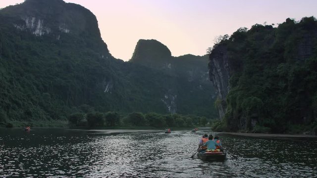 Boats on a river in Ninh Binh, Vietnam