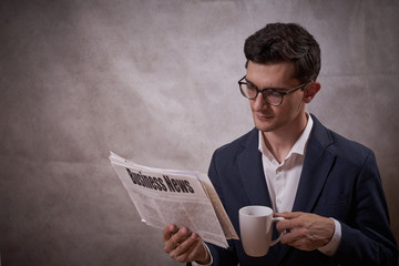 Business Man with newspaper, morning news