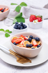 Sweet tiny pancake cereals with berries