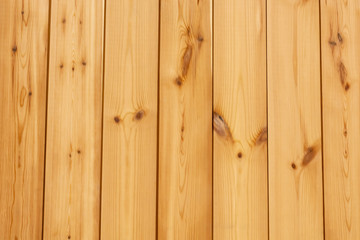 Background from wood panels. Boards are located vertically. Beautiful background close-up