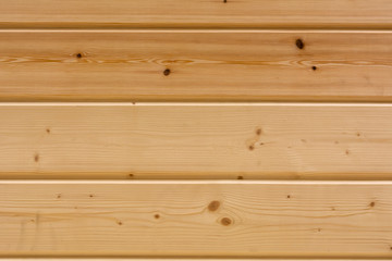 Fototapeta premium Wall of wood panels horizontal. Wooden texture with a closeup pattern.