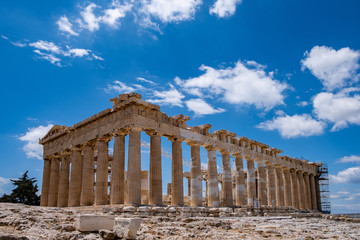 Obraz premium Athens, Greece. Parthenon temple on Acropolis hill, blue sky background