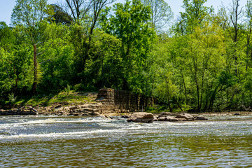 The Ruins of an Old Mill on a River.