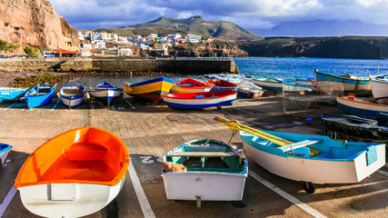 travel in Grand Canary island - traditional fishing village Puerto de Sardina with old colorful...